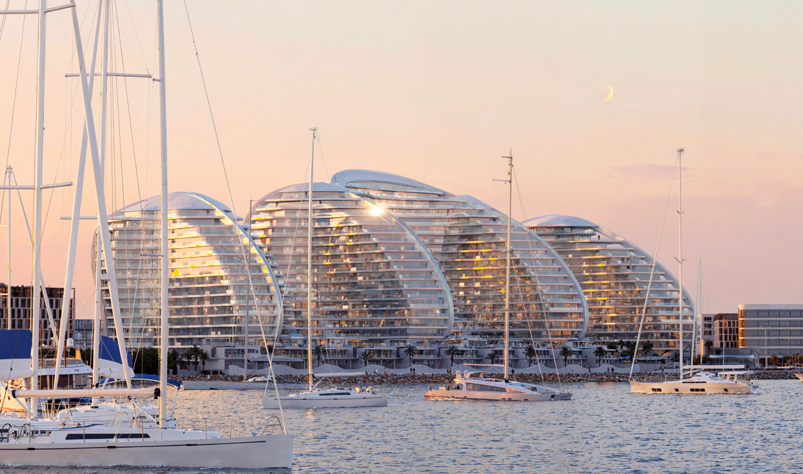 Oystra: waterfront buildings viewed from a marina with sailing boats — rendering